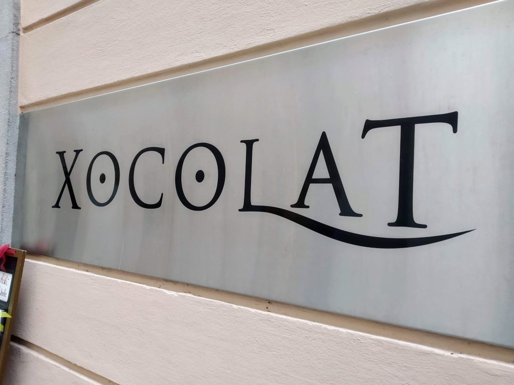 Xocolat Logoschriftzug Schokolade vegan Linz